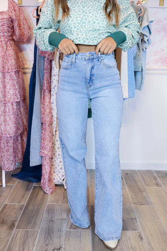 Step up your denim game with the Leila Wide Leg Jeans in Light Wash. High rise, ultra-flattering wide leg, and a vintage vibe you’ll love.