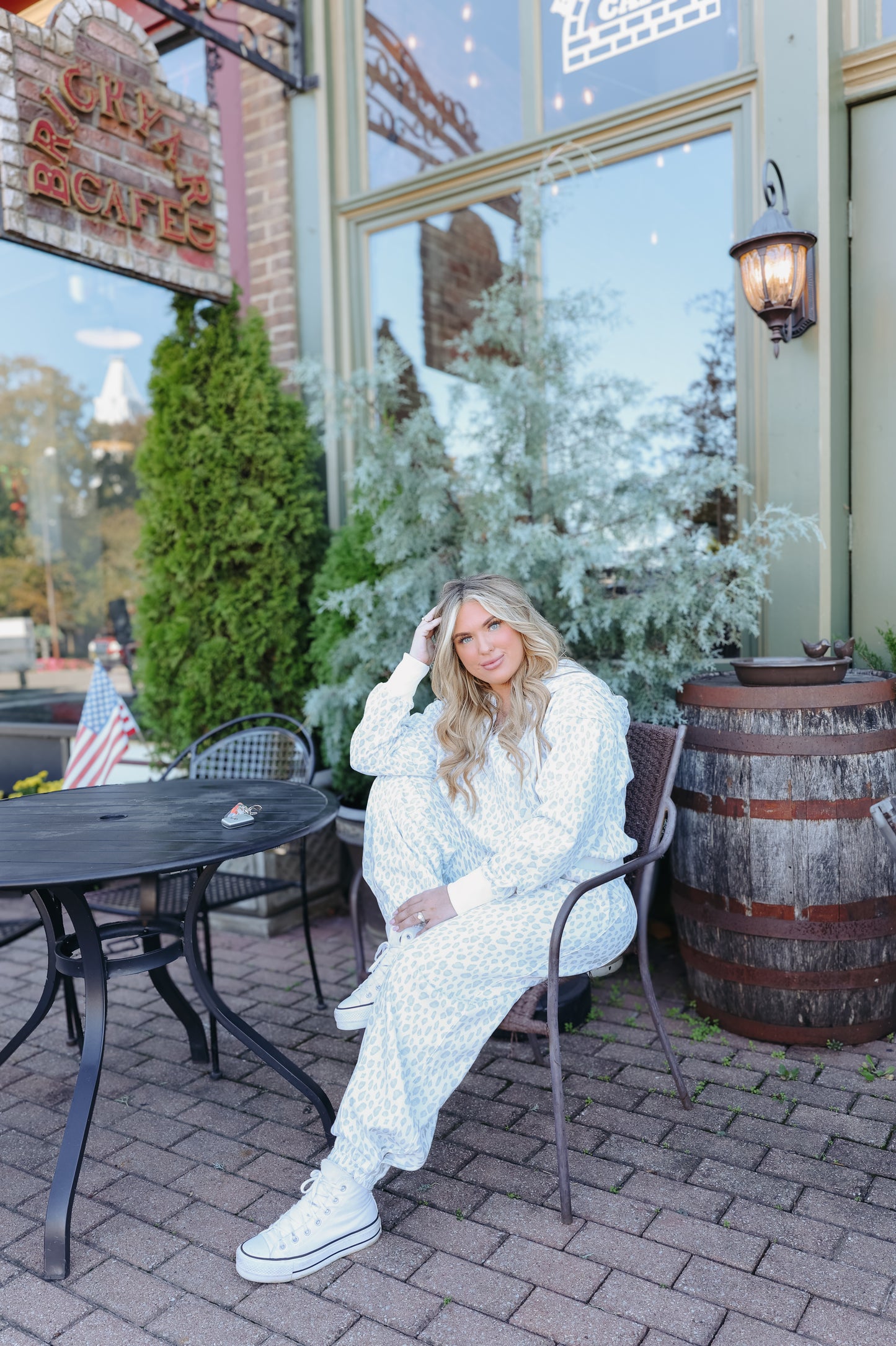 Model wearing light grey leopard print sent.