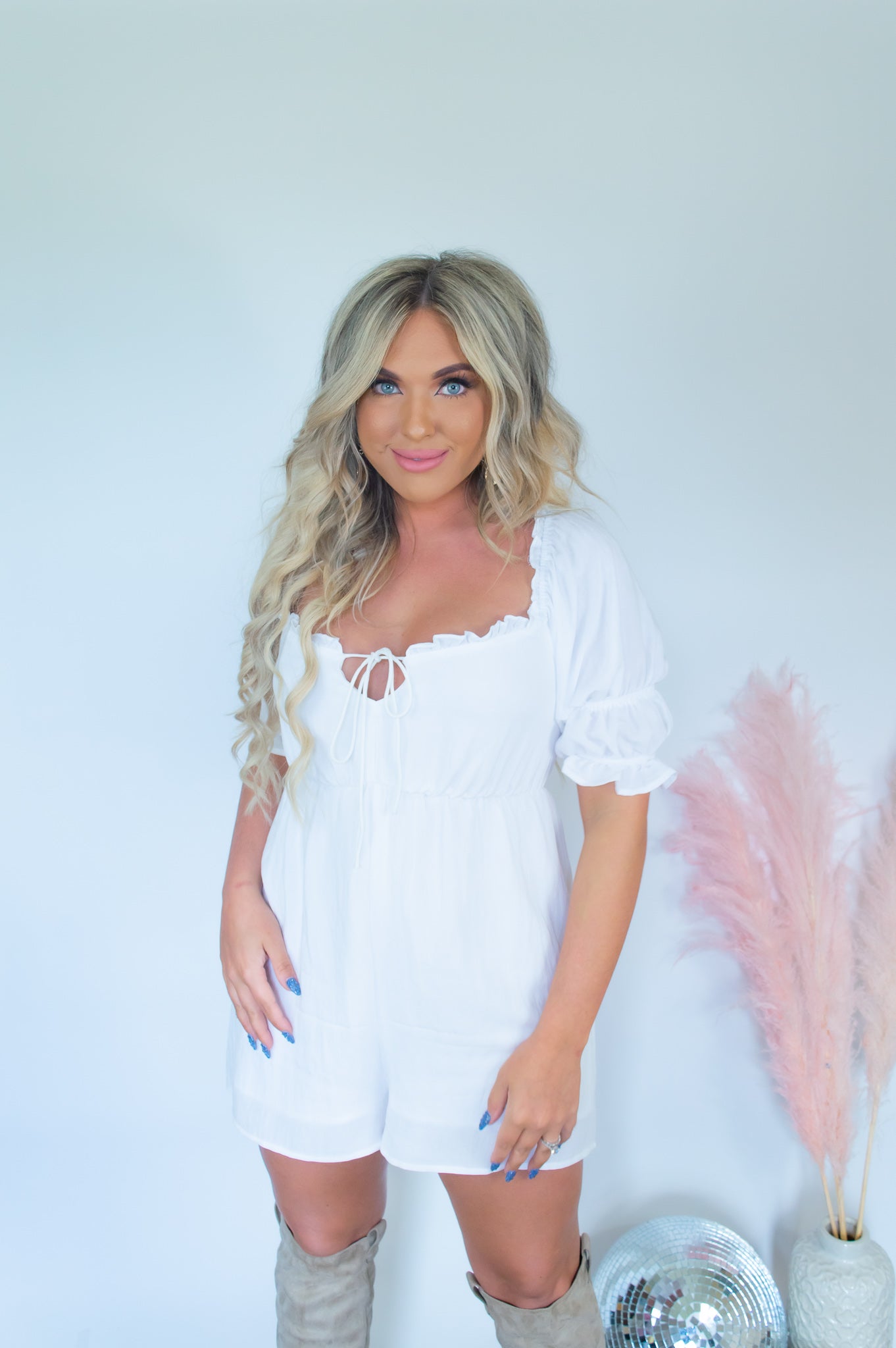 White romper country music outfit white ruffle romper short romper ruffle detailing Nashville outfit summer romper lightweight romper suede boots country music concert outfit
